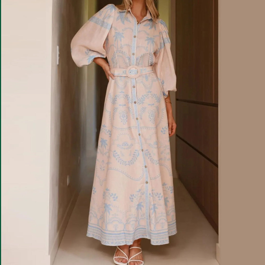 Women's modest blue palm ornamental pattern button-up collar, puff-sleeve self-belt maxi dress.