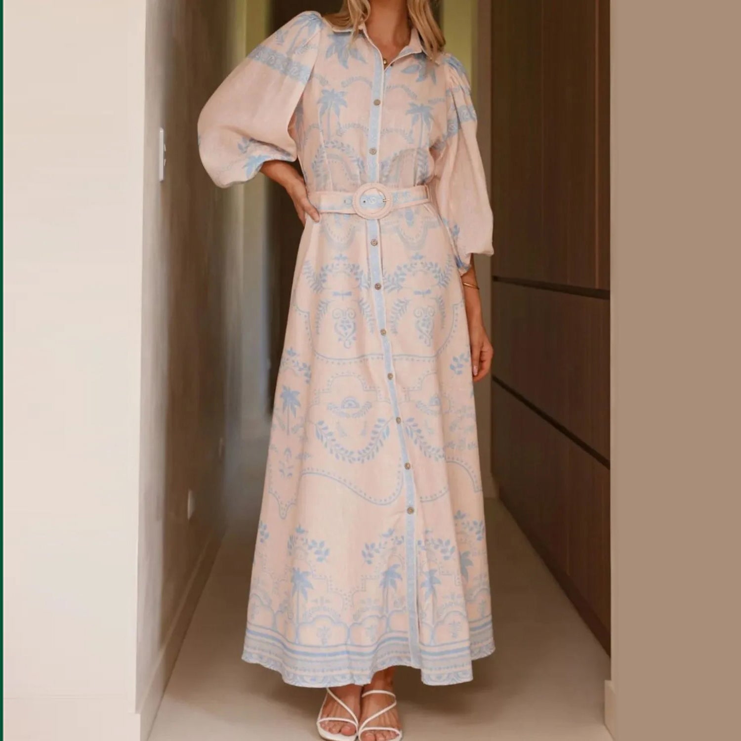 Women's modest blue palm ornamental pattern button-up collar, puff-sleeve self-belt maxi dress.