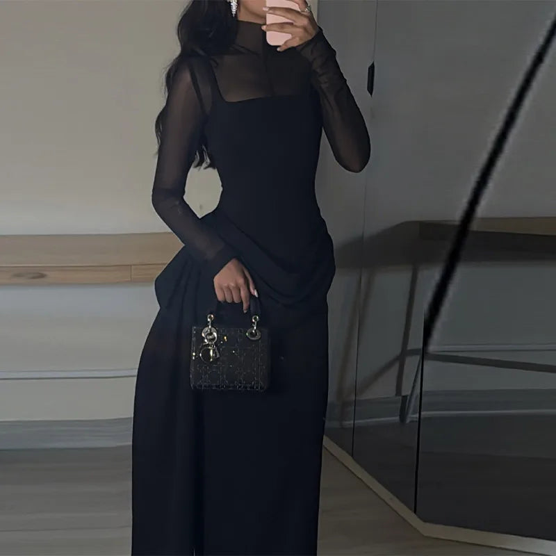 Elegant black long sleeve sheer mock neck overlay bodice, draped column skirt evening maxi dress.