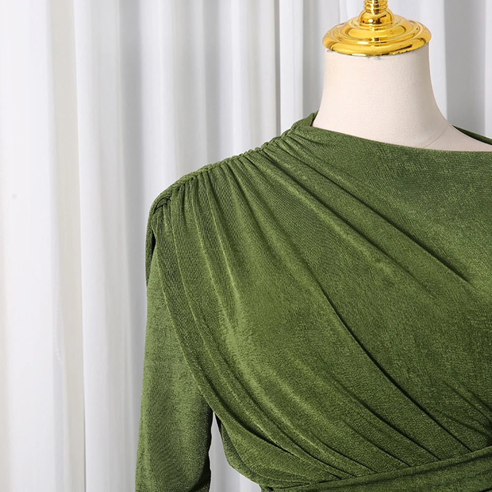 Slight stretch fabric, gathered shoulder detail of the olive green Layla Gathered maxi dress