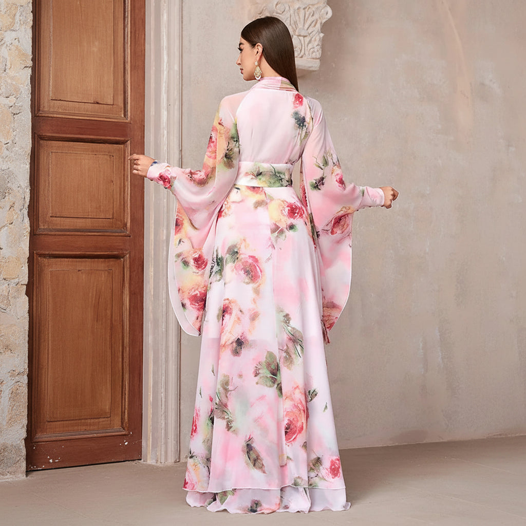 Modest pink floral chiffon cape sleeves, pleated neckline tie, high-low maxi dress back.