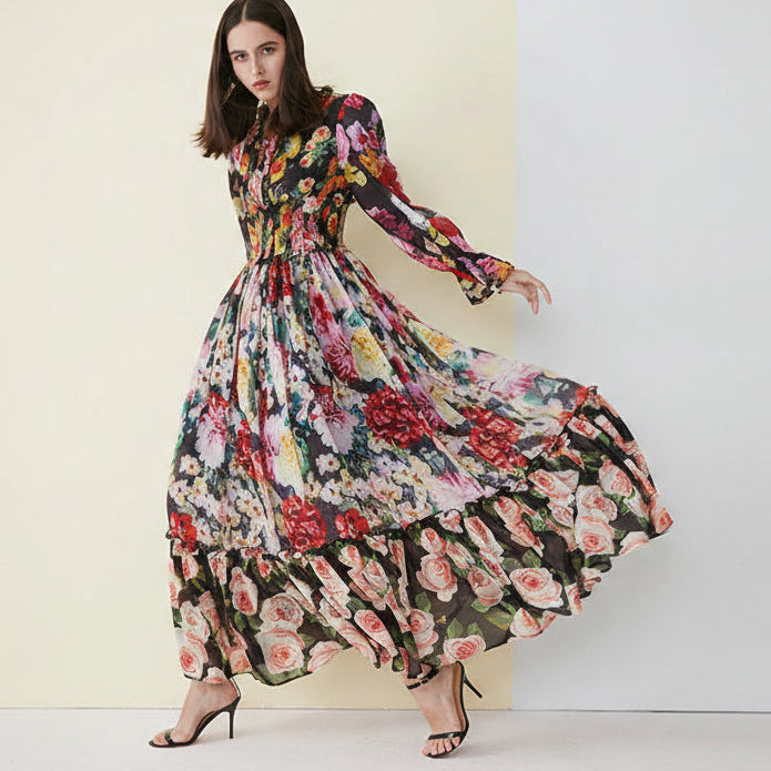 Multi-coloured floral, modest, long ruffle sleeve black tiered maxi dress.