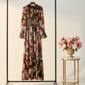 Multi-coloured floral, modest black tiered maxi dress.
