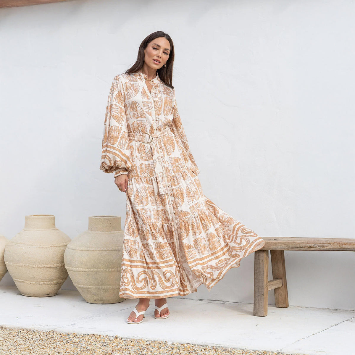Flowing skirt of a beige Seashells print modest maxi dress